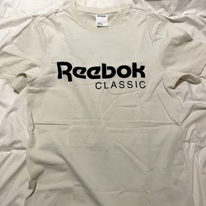 Reebok Off white colored T shirt in size S